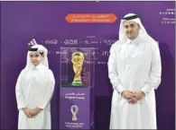  ?? ?? Dr. Mohammad Diab, associate vice president for Student Life and Services with FIFA World Cup Trophy 2022 at Qatar University