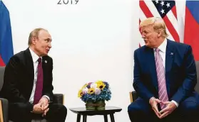  ?? Erin Schaff / New York Times ?? Russian President Vladimir Putin meets with President Donald Trump on Friday for the first time in almost a year at the Group of 20 summit in Osaka, Japan.