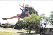  ??  ?? Troubadour, who also served as the camp photograph­er, enjoyed a ride on the zip line. Campers go by nicknames for the event.