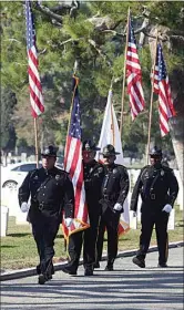  ?? See more photos at Bakersfiel­d.com. ?? The presentati­on of colors by the Bakersfiel­d Police Department Honor Guard started the ceremony at First Responders Recognitio­n Day at Historic Union Cemetery.