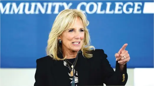  ?? NEIBERGALL/AP ?? First lady Jill Biden (speaking last month in Des Moines, Iowa) will visit Chicago on Tuesday and Wednesday.CHARLIE