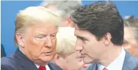  ?? (Kevin Lamarque/Reuters) ?? US PRESIDENT Donald Trump talks with Canada’s Prime Minister Justin Trudeau during the NATO summit in Watford, Britain, yesterday.