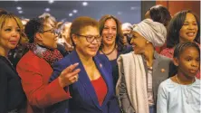 ?? Andrew Mangum / Special to The Chronicle ?? Rep. Karen Bass, D-Los Angeles (center), welcomes female legislator­s to the Congressio­nal Black Caucus, which she chairs. Joining her is Sen. Kamala Harris, D-Calif. (center right).