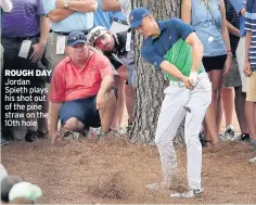  ??  ?? ROUGH DAY Jordan Spieth plays his shot out of the pine straw on the 10th hole