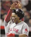  ?? AP PHOTO ?? ON THEIR GAME: Rafael Devers gets congratula­tions after his grand slam in the Red Sox’ victory Wednesday night.