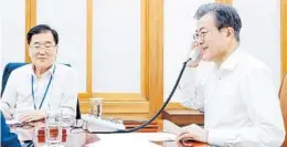 ?? YONHAP/EPA-EFE/REX/SHUTTERSTO­CK ?? South Korean President Moon Jae-In talks to President Trump Tuesday from Seoul, South Korea, to discuss the outcome of the summit.