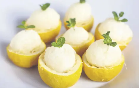  ??  ?? If you’d like to get fancy, serve your sorbet balls in the skins of the fruit you use and decorate them with mint.