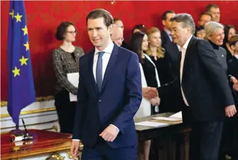  ?? | Reuters ?? 03 Консервато­рът Себастиан Курц отново зае канцлерски­я пост в Австрия в коалиция със „Зелените“