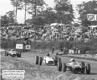  ??  ?? Lola of Surtees leads the Lotus of Hill on the way to a hard-fought victory