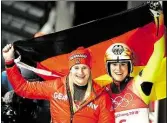  ?? AP-BILD: WONG ?? Doppelte Freude: Rodlerin Natalie Geisenberg­er (rechts) holte Gold, Dajana Eitberger fuhr auf den Silberrang.