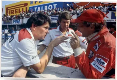  ??  ?? Chief designer Barnard in heated debate with star driver Niki Lauda in the pits at Monza ahead of the 1982 Italian Grand Prix