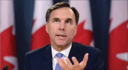  ?? SEAN KILPATRICK, THE CANADIAN PRESS ?? Finance Minister Bill Morneau admits he will be affected by a proposed new law that will prevent the rich from shielding incomes to gain tax advantages.
