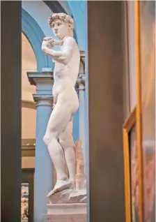  ?? AP PHOTO/ANDREW MEDICHINI ?? Michelange­lo’s 16th century statue of David is displayed March 18 at the Accademia gallery in Florence, Italy.