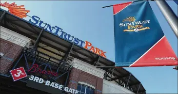  ?? CURTIS COMPTON / CCOMPTON@AJC.COM ?? BB&amp;T’s acquisitio­n of SunTrust likely means a name change for the Braves’ home.