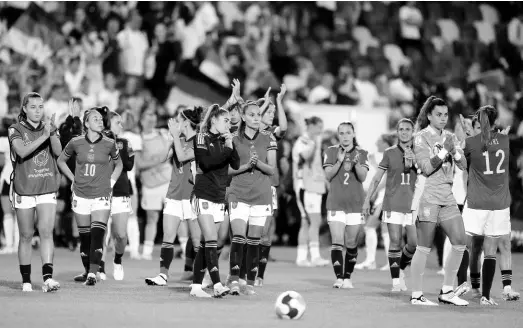  ?? AP PHOTOS ?? Spain’s players applaud the fans at the end of a Women’s Euro 2022 Group B match against Germany on July 12, 2022, in London. Germany won 2-0.