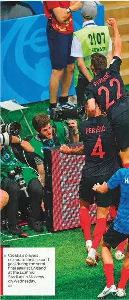  ?? AFP ?? Croatia’s players celebrate their second goal during the semifinal against England at the Luzhniki Stadium in Moscow on Wednesday.