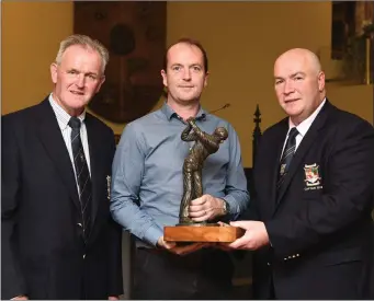  ??  ?? Derry McCarthy Captain presenting the Golfer of the Year Award to Matt Leahy with (left) Jack Buckley President at Killarney Golf and Fishing Club on Thursday.Photo by Michelle Cooper Galvin