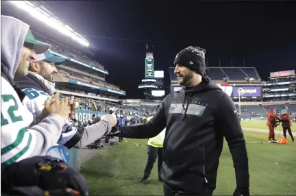  ?? JULIO CORTEZ — THE ASSOCIATED PRESS ?? Although the game Saturday would result in an Eagles loss, head coach Nick Sirianni could only draw smiles while meeting fans after the game at Lincoln Financial Field.