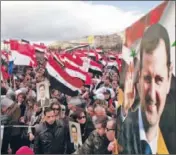  ?? Youssef Badawi European Pressphoto Agency ?? THRONGS TURN OUT in support of Assad at Umayyad Square in Damascus, the capital. ProAssad rallies were also held in other cities.