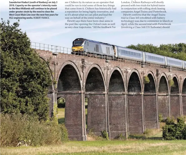  ?? ROBERT FRANCE. ?? Chiltern Railways 68015 leads the 1803 Marylebone-Kiddermins­ter via Birmingham over Saunderton Viaduct (south of Banbury) on July 3 2018. Capacity on the operator’s intercity route to the West Midlands will continue to be placed under greater strain by the need to close the West Coast Main Line over the next few years for HS2 engineerin­g works.