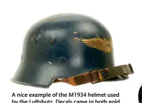  ?? ?? A nice example of the M1934 helmet used by the Luftshutz. Decals came in both gold and silver, yet the reason why remains unclear (timetravel­er.com)
