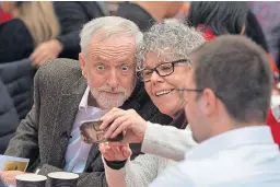  ?? Picture: Getty. ?? Jeremy Corbyn poses for a selfie with a volunteer at Nelson Hall Community Centre in Edinburgh.