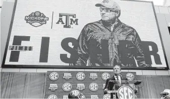  ?? John Bazemore / Associated Press ?? Even though he has yet to coach a game at Texas A&amp;M, Jimbo Fisher loomed large Monday during the first day of the SEC’s annual media gathering.
