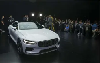  ?? CHINATOPIX VIA THE ASSOCIATED PRESS ?? Polestar’s first model is made of lightweigh­t carbon fibre and promises a range of 150 kilometres on a charge.