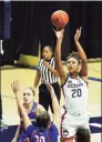  ?? David Butler II / Associated Press ?? UConn’s Olivia Nelson-Ododa (20) shoots over the UMass Lowell defense during the first half on Saturday in Storrs.