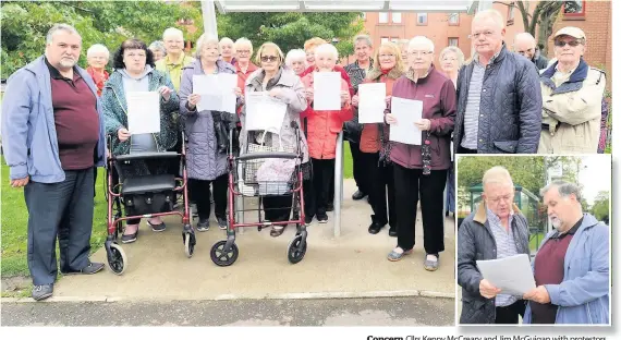  ??  ?? Concern Cllrs Kenny Mccreary and Jim Mcguigan with protestors