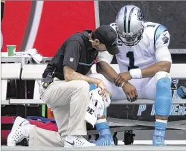  ?? AP ?? The Panthers said Cam Newton hurt his passing shoulder Dec. 11 against the Chargers. The quarterbac­k was limited in practice but played the final three games of 2016.