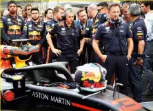  ??  ?? above Red Bull Racing team principal Christian Horner (right) inspects the grid before the start of the Monaco Grand Prix.