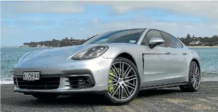  ?? PHOTOS: DAVID LINKLATER/STUFF ?? Having a luxury Porsche is all about the green: brakes and badges in the case of the Panamera 4 E-Hybrid.