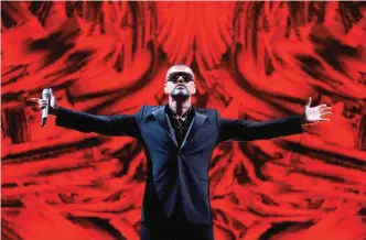 ??  ?? In this Sept 9, 2012 file photo, British singer George Michael performs at a concert to raise money for the AIDS charity Sidaction, during the Symphonica tour at Palais Garnier Opera house in Paris, France. — AP/AFP photos