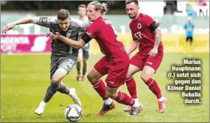  ??  ?? Marius Hauptmann (l.) setzt sich
gegen den Kölner Daniel Buballa
durch.