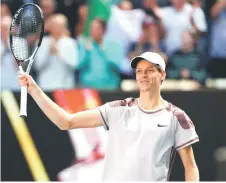  ?? — AFP photo ?? Sinner celebrates victory against Djokovic during their men’s singles semifinal match in Melbourne.