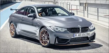  ??  ?? Special edition M4 GTS has a boot spoiler and colourful wheels that would make a Subaru STi blush.