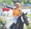  ?? ?? Top jockey Opie Bosson gives a victory saluteafte­r an exceptiona­l winning ride aboard On The Bubbles at Ellerslie on Boxing Day.