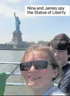  ??  ?? Nina and James spy the Statue of Liberty