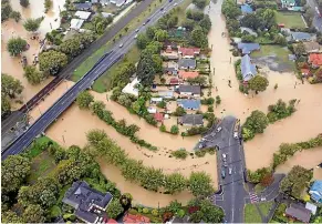  ?? JOHN KIRK-ANDERSON/STUFF ?? Extreme river flooding in Christchur­ch after heavy rain in 2014.