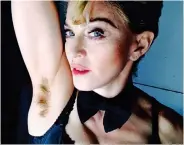  ??  ?? Long hair, don’t care: Madonna in 2014
