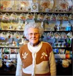  ??  ?? Jane Fortune in front of her kitchen dresser.