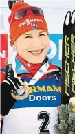  ?? Anastasia Kuzminová se zlatou medailí v Hochfilzen­u. FOTO ČTK ?? Vítězka.
