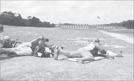  ??  ?? Shooters getting ready at the refurbishe­d Timehri Rifle Ranges. (Photo courtesy of Paul Slowe)