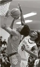  ?? Photos by Elizabeth Conley / Staff photograph­er ?? Crosby guard Sean “PJ” Haggerty, left, finished with 30 points and 13 rebounds in the upset of Hightower.