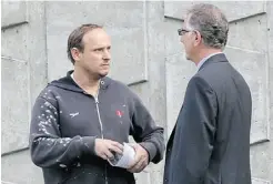  ?? LYLE STAFFORD/ VICTORIA TIMES COLONIST ?? Trevor Palmatier, left, outside court Friday in Victoria, B.C.