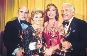  ?? SOURCE: TVA/PICTURE GROUP/INVISION ?? Left to right, “The Mary Tyler Moore Show” co-stars Ed Asner, Betty White, Mary Tyler Moore and Ted Knight all won an award at the 1976 Emmys.