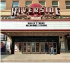  ?? MIKE DE SISTI / MILWAUKEE JOURNAL SENTINEL ?? The Riverside Theater marquee shows its support for the Molson Coors shooting victims with a Miller Strong and Milwaukee Strong message at the venue on Wisconsin Avenue.