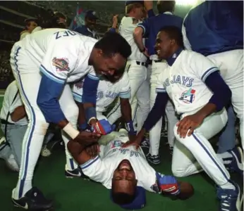  ?? DICK LOEK/TORONTO STAR FILE PHOTO ?? The Blue Jays celebrate their 1993 World Series-clinching victory in Game 6 over the Phillies on Oct. 23, 1993.