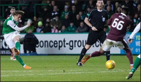  ??  ?? Scott Allan smashes a left-foot shot low past the Hearts defence and into the corner of Jon McLaughlin’s net to give the home side the lead